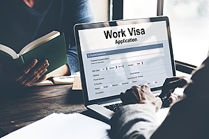 an immigration attorney helping an individual file an EB-4 visa application