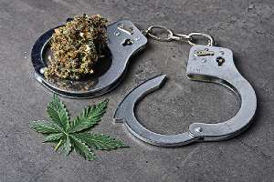 Cannabis with handcuffs depicting decriminalization. Virginia recently decriminalized marijuana