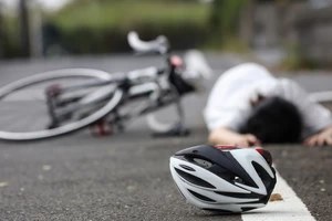 injured cyclist hit by another vehicle