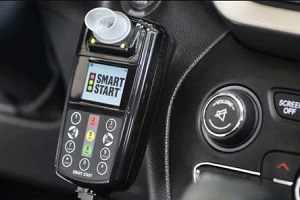 ignition interlock device placed near the steering of someone wondering how long do i need an ignition interlock device