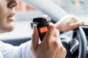 Breathalyzer test while driving a car