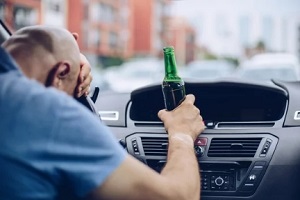 Fairfax, VA stressed man after drinking beer in the car