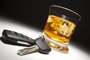 car keys with alcohol glass